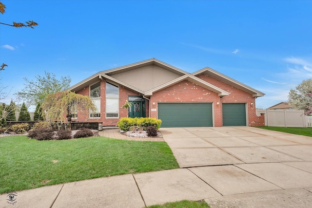 view of front of property with a garage, a front yard, driveway, and brick siding