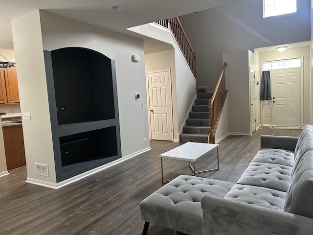 567 S Jade Ln, Round Lake, IL 60073 - living room featuring baseboards, dark wood-type flooring, and visible vents