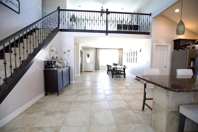 16725 92nd Ave, Orland Hills, IL 60487 - entrance foyer featuring a high ceiling, stairs, baseboards, light tile patterned floors, and recessed lighting