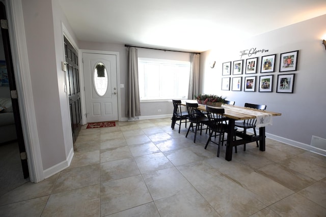 16725 92nd Ave, Orland Hills, IL 60487 - dining space with light tile patterned floors and baseboards