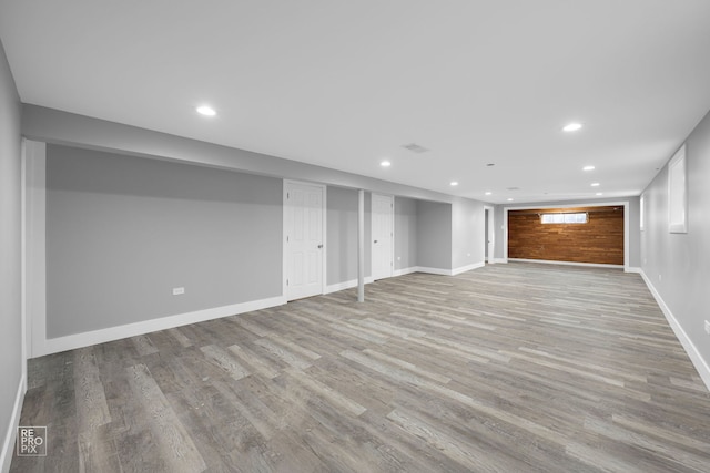 6330 W 64th Pl, Chicago, IL 60638 - finished below grade area featuring recessed lighting, wood finished floors, visible vents, and baseboards