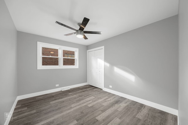 6330 W 64th Pl, Chicago, IL 60638 - empty room featuring visible vents, baseboards, wood finished floors, and ceiling fan