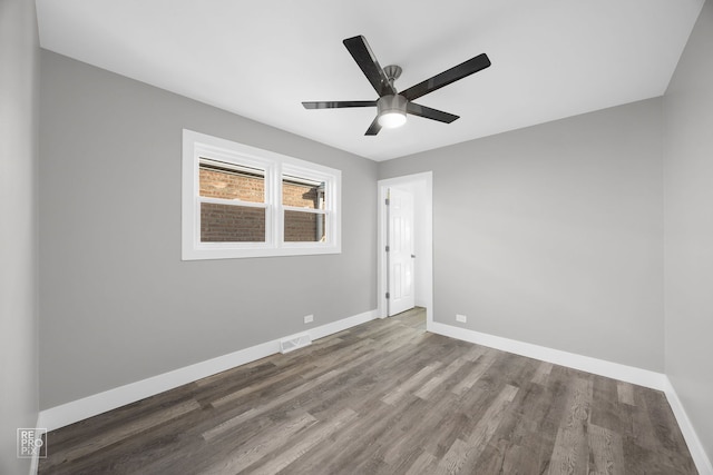 6330 W 64th Pl, Chicago, IL 60638 - spare room with baseboards, wood finished floors, visible vents, and a ceiling fan