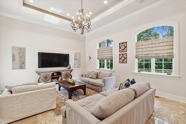 living room with a notable chandelier, a raised ceiling, baseboards, ornamental molding, and recessed lighting