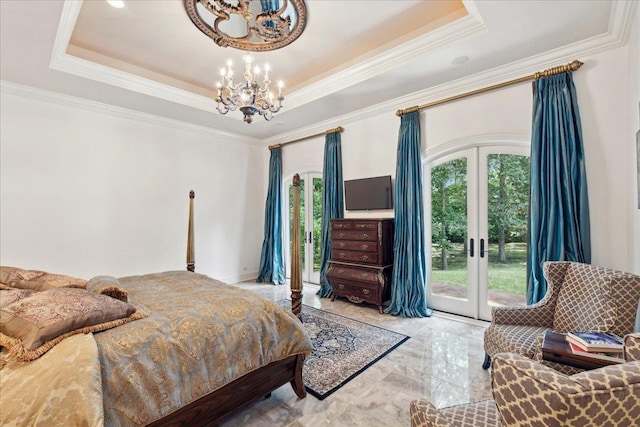 bedroom featuring a raised ceiling, access to exterior, ornamental molding, french doors, and a notable chandelier