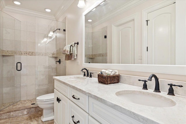 bathroom featuring a shower stall, ornamental molding, and a sink