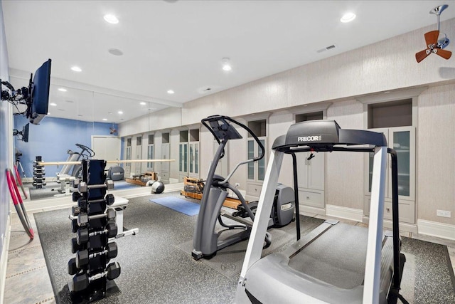 exercise room with visible vents and recessed lighting
