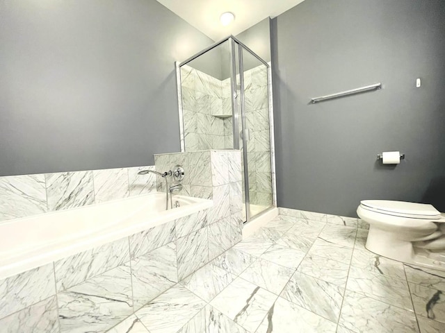 bathroom with a garden tub, a shower stall, and toilet