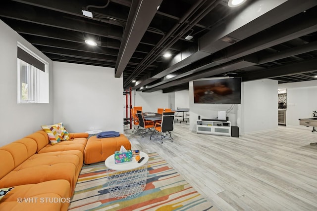 living area with wood finished floors