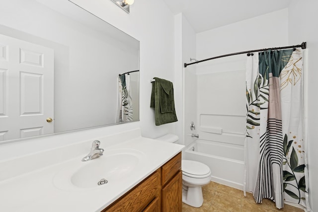 bathroom with tile patterned floors, shower / tub combo, vanity, and toilet
