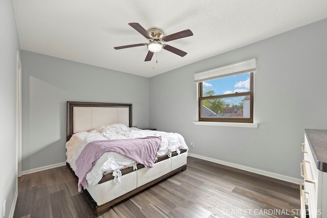 516 Gardiner Ct, Romeoville, IL 60446 - bedroom with baseboards, wood finished floors, and a ceiling fan