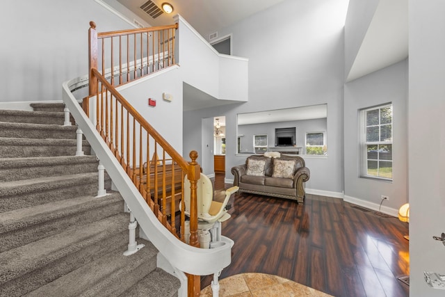 1844 Candlelight Cir, Montgomery, IL 60538 - staircase featuring wood finished floors and baseboards