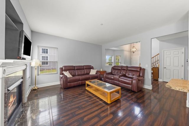 1844 Candlelight Cir, Montgomery, IL 60538 - living area featuring a premium fireplace, wood finished floors, and stairway