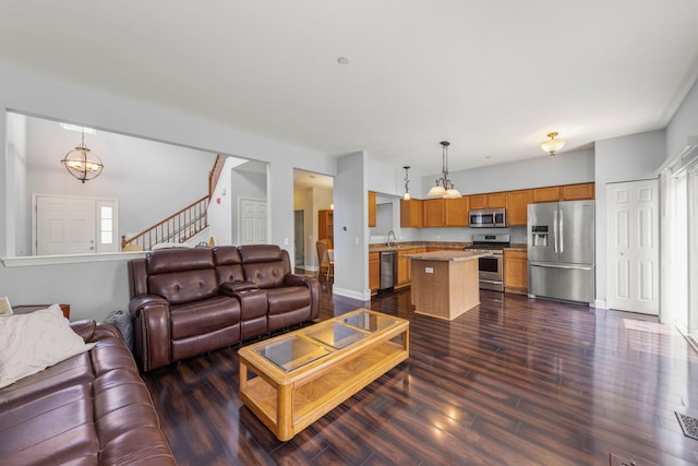 1844 Candlelight Cir, Montgomery, IL 60538 - living room featuring stairway and dark wood finished floors