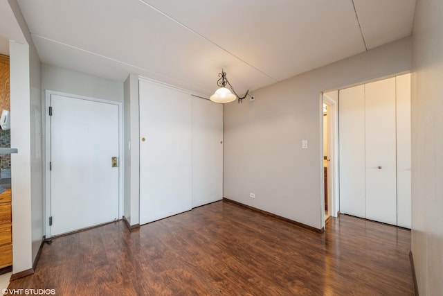 2005 S Finley Rd Unit 611, Lombard, IL 60148 - unfurnished dining area featuring wood finished floors and baseboards