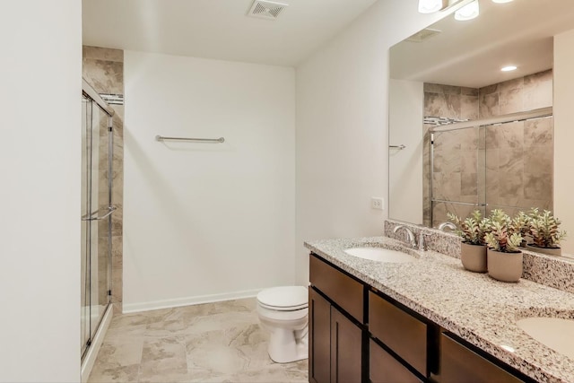 full bath with a shower stall, visible vents, and a sink