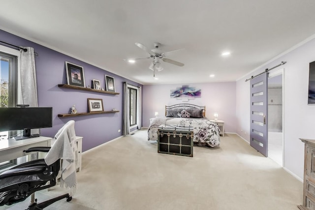 bedroom featuring baseboards, light carpet, recessed lighting, and a barn door