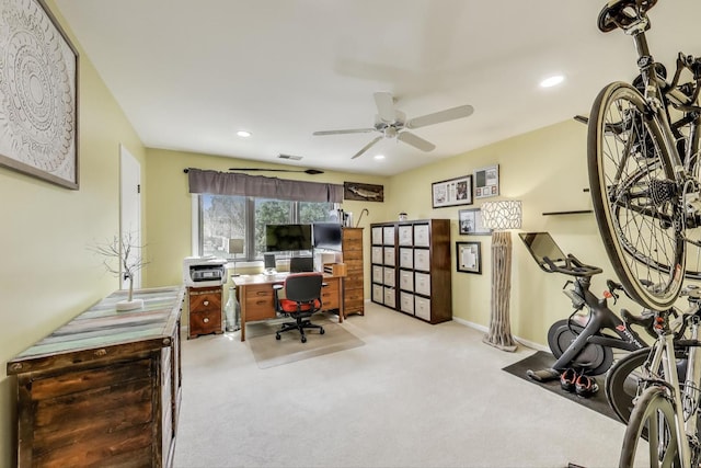 carpeted home office with a ceiling fan, visible vents, and recessed lighting