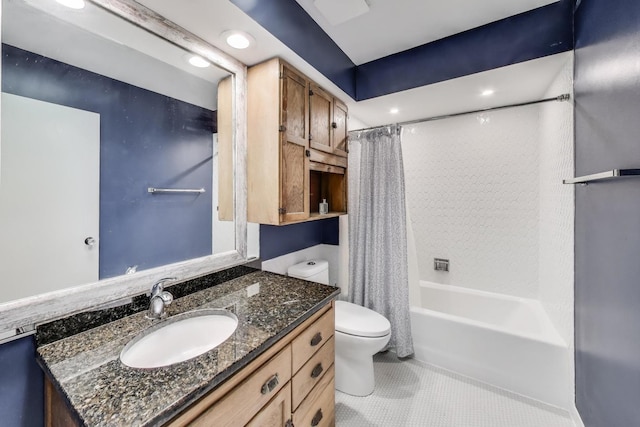 bathroom featuring tile patterned floors, shower / bath combo, vanity, and toilet