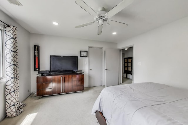 bedroom featuring recessed lighting, a ceiling fan, visible vents, and light carpet