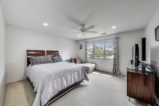 carpeted bedroom with recessed lighting, a ceiling fan, and visible vents