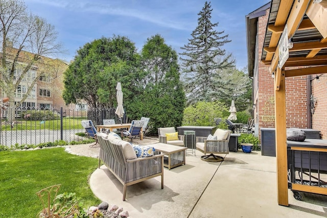 view of patio / terrace featuring fence, an outdoor hangout area, and outdoor dining space