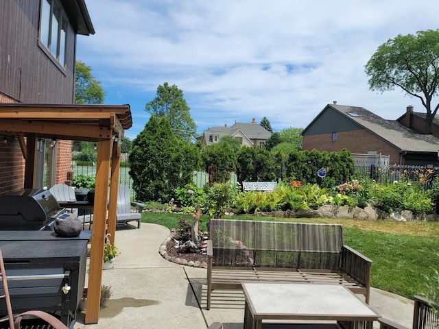 view of patio / terrace featuring fence