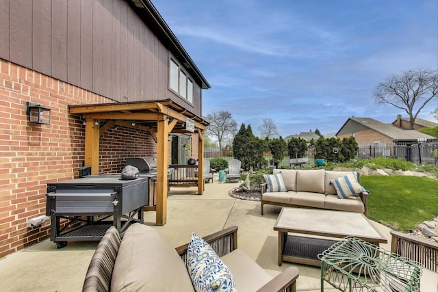 view of patio featuring fence and an outdoor living space