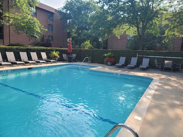 community pool featuring a patio