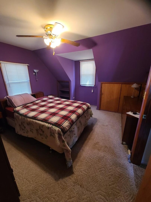 128 Whitehall Ave, Northlake, IL 60164 - bedroom with lofted ceiling, a ceiling fan, and light colored carpet