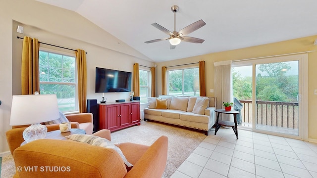196 Tyler Ct, Lake Zurich, IL 60047 - living area with vaulted ceiling, plenty of natural light, a ceiling fan, light tile patterned flooring, and baseboards