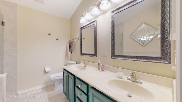 196 Tyler Ct, Lake Zurich, IL 60047 - full bath featuring toilet, double vanity, tile patterned flooring, tiled shower, and baseboards