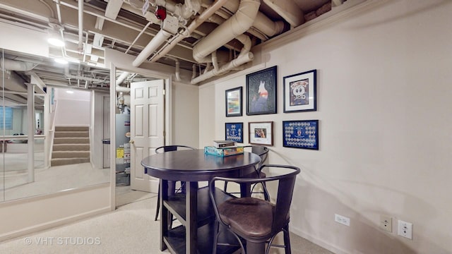 196 Tyler Ct, Lake Zurich, IL 60047 - carpeted dining space featuring water heater and stairway