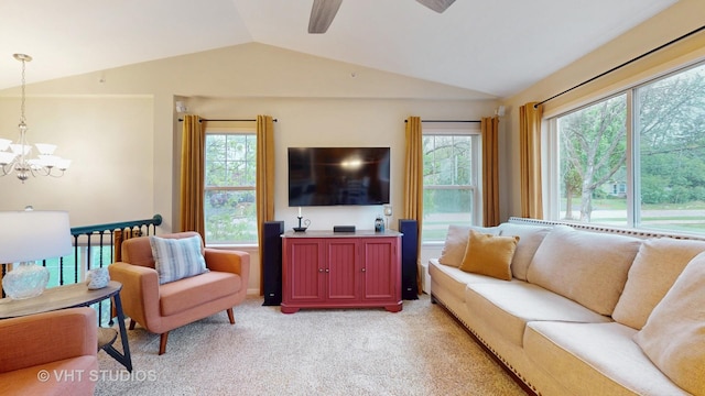 196 Tyler Ct, Lake Zurich, IL 60047 - living room featuring vaulted ceiling, a chandelier, plenty of natural light, light carpet, and a ceiling fan
