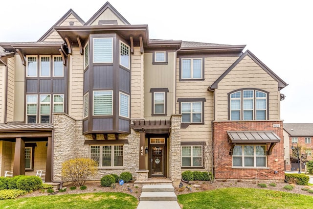 view of front of home featuring stone siding