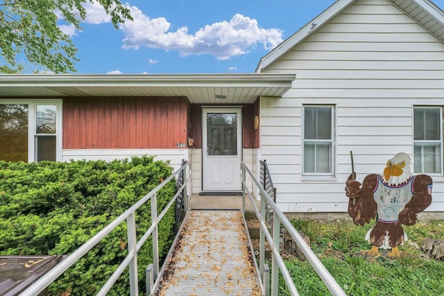 doorway to property with board and batten siding