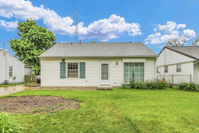 907 E Glenview Dr, Tuscola, IL 61953 - back of house with roof with shingles