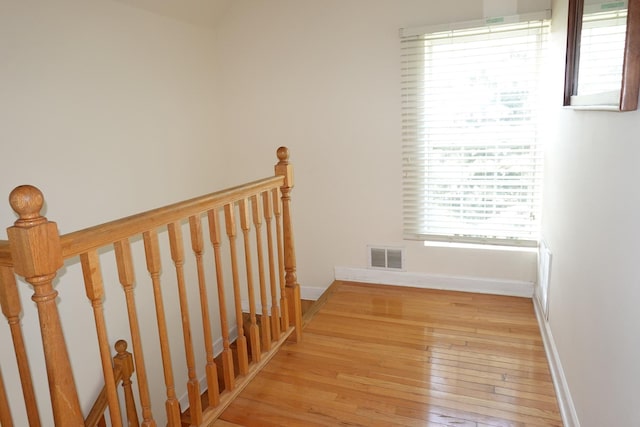 11108 S Myrtle St, Huntley, IL 60142 - staircase featuring healthy amount of natural light, hardwood / wood-style floors, and baseboards