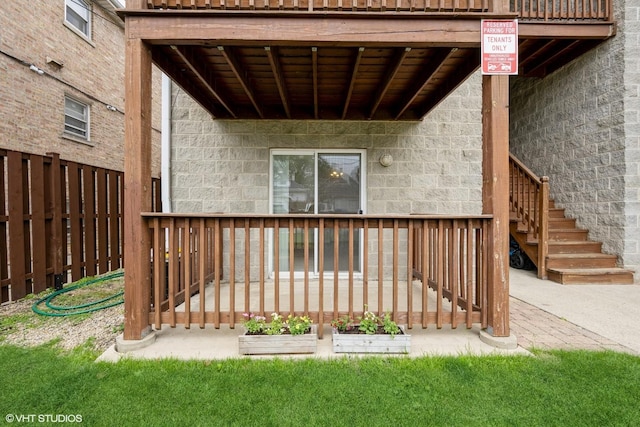 entrance to property featuring a deck