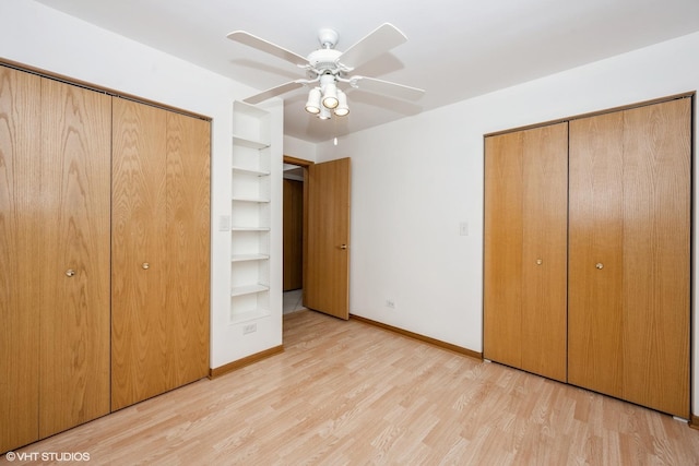 unfurnished bedroom featuring a closet, light wood-style floors, baseboards, and a ceiling fan