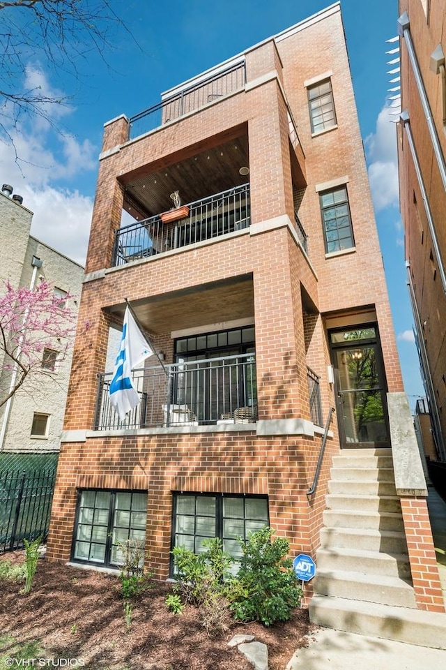 view of building exterior featuring entry steps