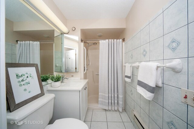 1285 Luther Ln Unit 369B, Arlington Heights, IL 60004 - full bath featuring tile patterned flooring, vanity, toilet, tile walls, and a shower with curtain