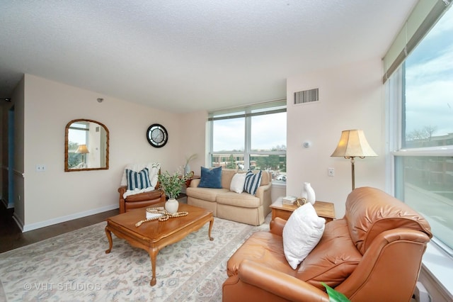 1285 Luther Ln Unit 369B, Arlington Heights, IL 60004 - living area featuring visible vents, baseboards, and wood finished floors