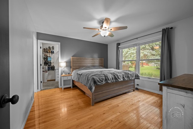 17 S Cypress Dr, Bristol, IL 60512 - bedroom featuring baseboards, light wood finished floors, and ceiling fan