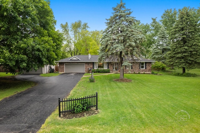17 S Cypress Dr, Bristol, IL 60512 - ranch-style home with an attached garage, driveway, and brick siding