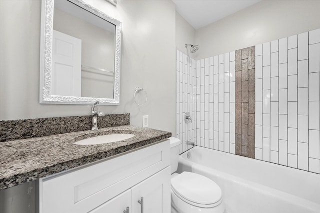 bathroom featuring shower / bath combination, vanity, and toilet