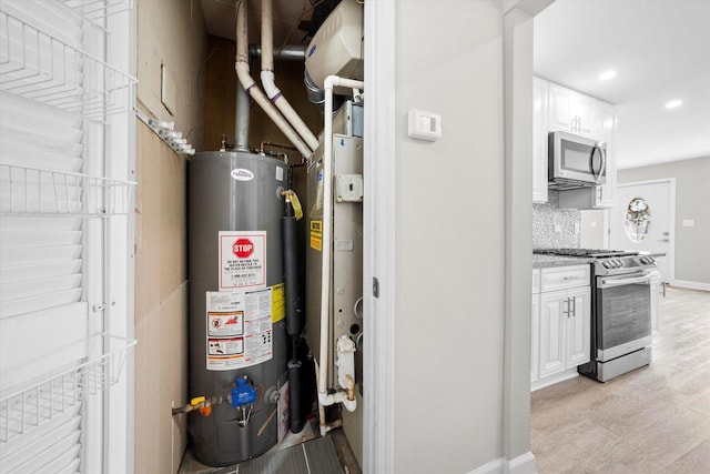 utility room with water heater