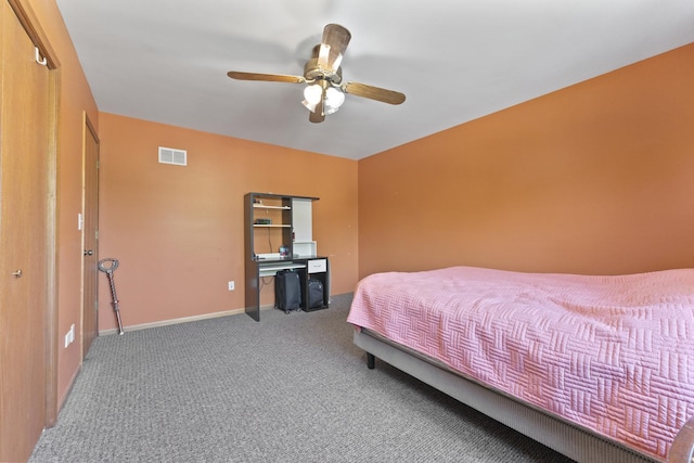 bedroom with carpet, a ceiling fan, and baseboards