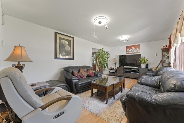 living area with light wood-style floors