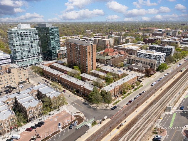 birds eye view of property featuring a view of city